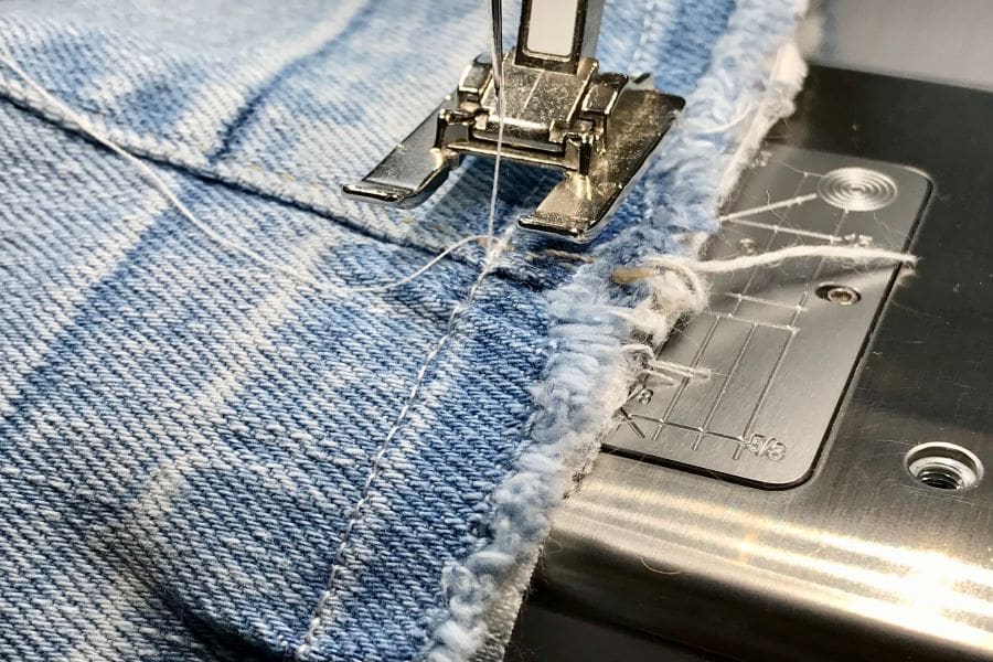 sewing a hem seam on jeans