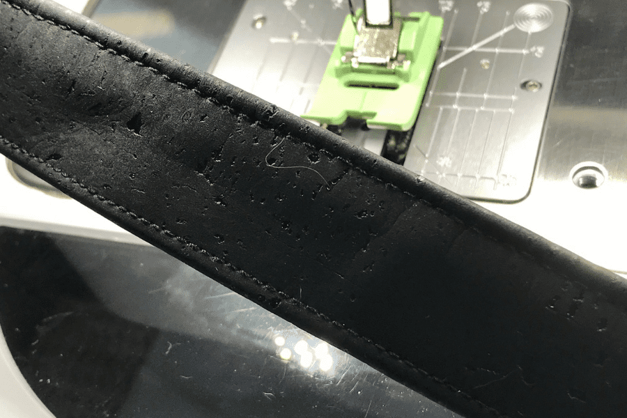 Close-up image of cork fabric straps and non-stick presser foot 