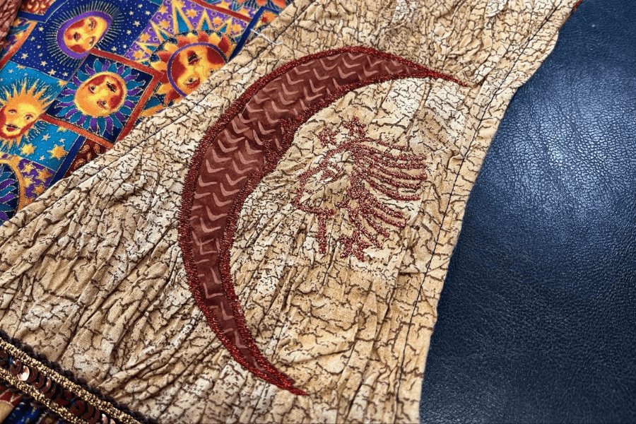 moon applique design using a satin stitch